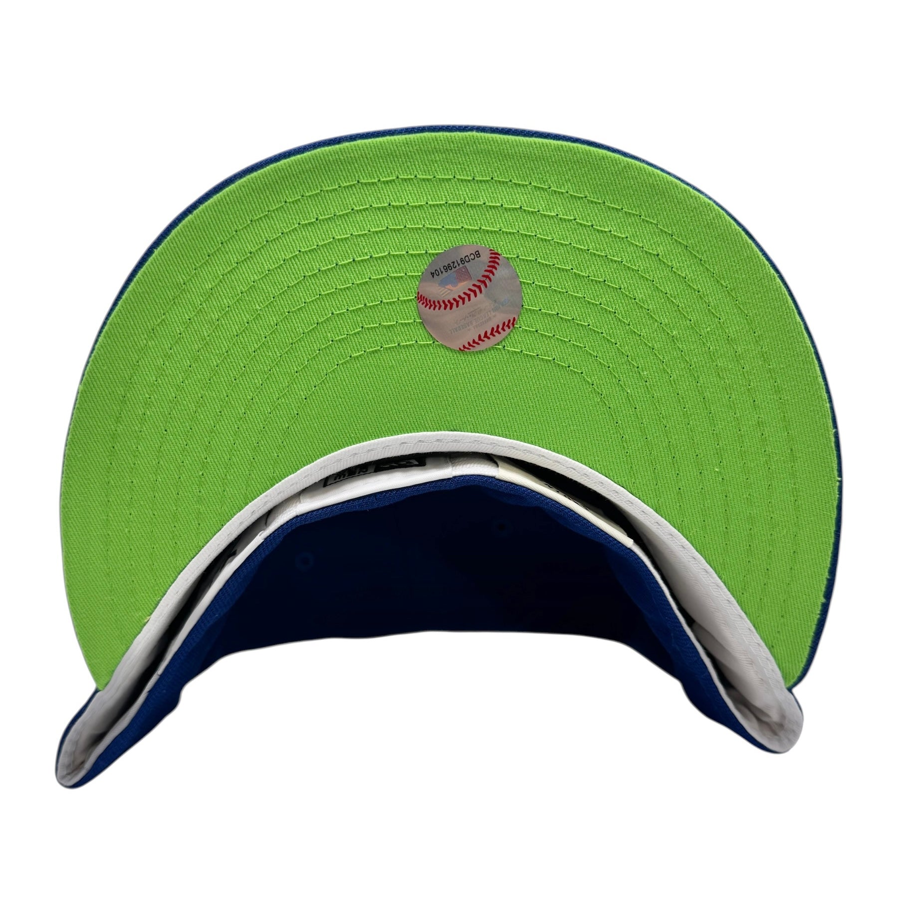 Green and blue cap with a baseball on a white background